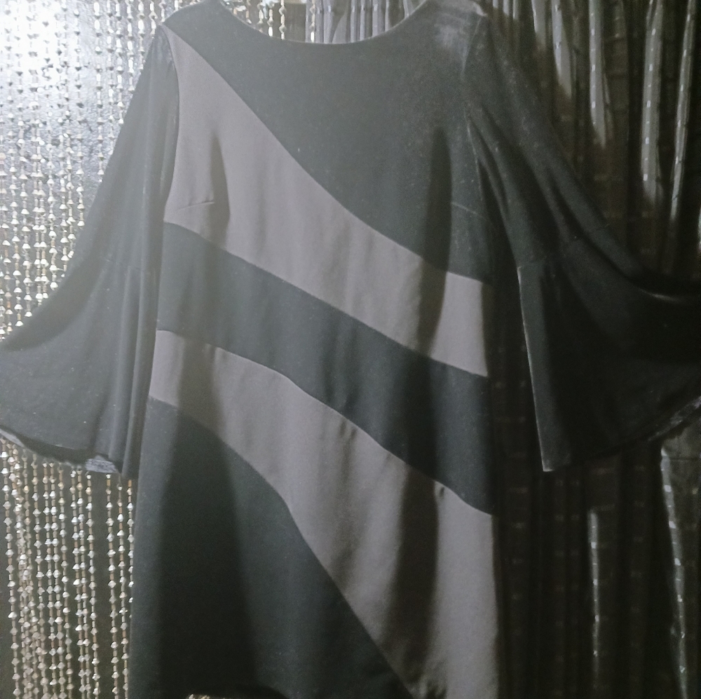 Go Glam  Velvet V- back with Green Satin lining. Bell sleeves.